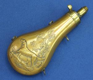 A very nice English 19th Century Antique Powder Flask by DIXON & SONS, height 19,5 cm, in very good condition.  Price 275 euro