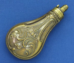 A fine antique 19th Century Embossed English Powder Flask, height 17 cm, in near mint condition. Price 300 euro