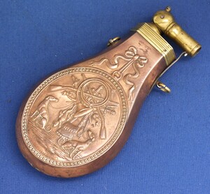 A fine antique 19th century French Embossed Powder Flask with knee action charger, height 19 cm, in very good condition. Price 375 euro