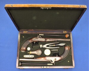 A fine antique 19th Century German Cased Pair Percussion Pistols signed RICKELT a  AROLSEN, caliber 11 mm fine grooves, length 43 cm, in very good condition. 