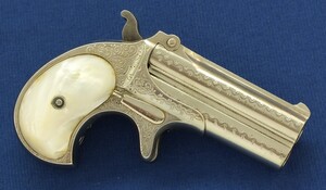 A fine antique American Nickel Plated factory Dot-Punch Engraved Remington Double Deringer Type I, Model No. 2 with Mother of pearl Grips. Caliber 41 Rimfire. In very good condition. Price 2.750 euro.