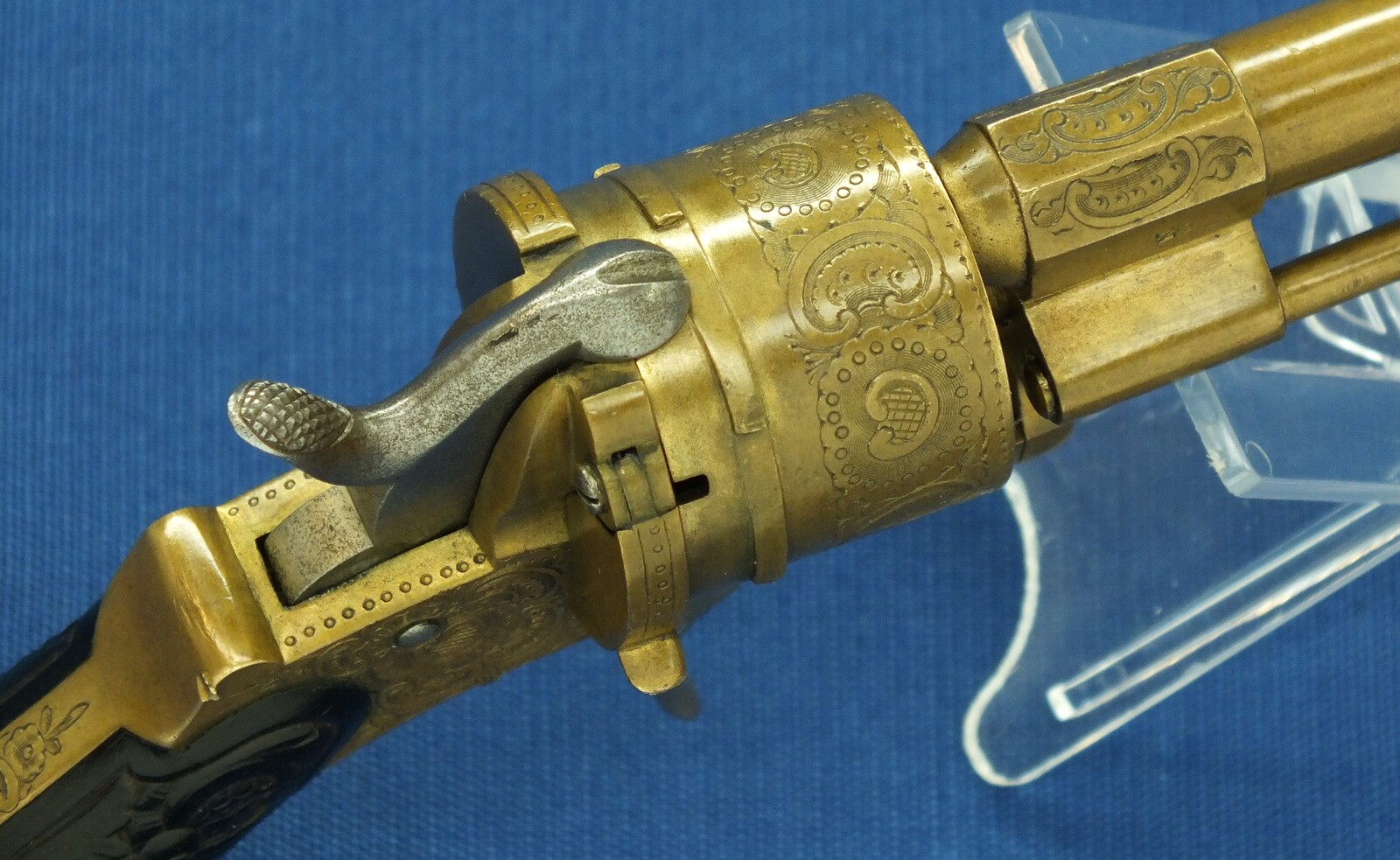 A rare antique Belgian Bronze 6 shot engraved Single and Double Action Pinfire Revolver. Caliber 7mm, length 20cm. In very good condition. Price 775 euro.