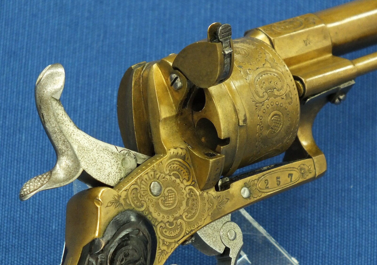A rare antique Belgian Bronze 6 shot engraved Single and Double Action Pinfire Revolver. Caliber 7mm, length 20cm. In very good condition. Price 775 euro.
