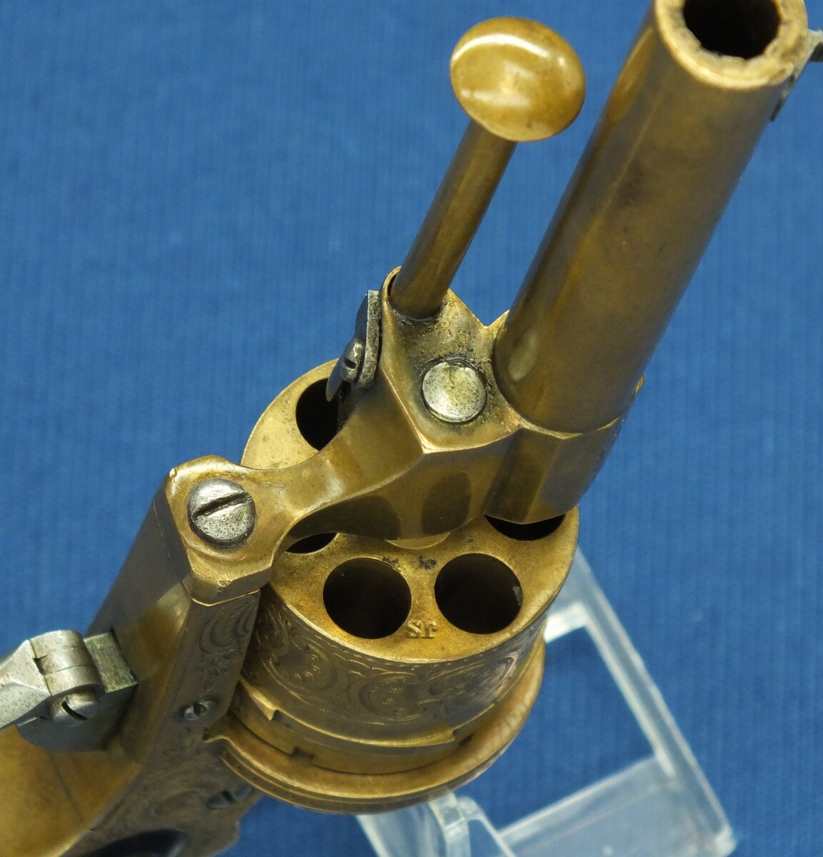 A rare antique Belgian Bronze 6 shot engraved Single and Double Action Pinfire Revolver. Caliber 7mm, length 20cm. In very good condition. Price 775 euro.