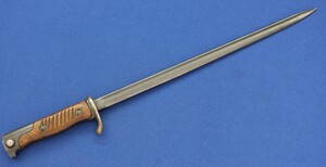 A rare Yugoslavian Model 1924 Bayonet for Mauser Rifle converted from German Model 1898 made by Simson & Co Suhl. Length 52cm. In very good condition. Price 150 euro
