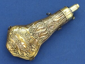 A very nice antique 19th century English embossed powderflask by G & J.W Hawksley Sheffield. Height 20,5 cm. In good condition. Price 275 euro