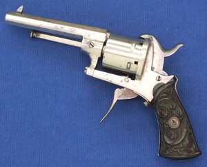 A very nice antique 19th century French nickel plated double and single action Pinfire Revolver,  caliber 7 mm, 6 shot, length 19,5 cm,  in very good condition. Price 550 euro
