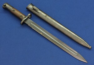 An antique Portuguese Model 1904 Bayonet for Mauser Vergueiro M1904 Rifle. German made by Simson & Co Suhl. Nr. C2566 on pommel. Length 42.5cm. In very good condition. Price 195 euro