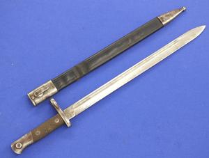 A very nice antique Spanish Bayonet Model 1913, length 55 cm, signed ARTILLERIA NATIONAL TOLEDO, Price 125 euro