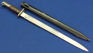 A Belgian Model 1924 Export Bayonet for FN Mauser M1924, 24/30 and 1934 Rifle. Nr. 8585 on top of pommel. Length 53,5cm. In very good condition. Price 175 euro