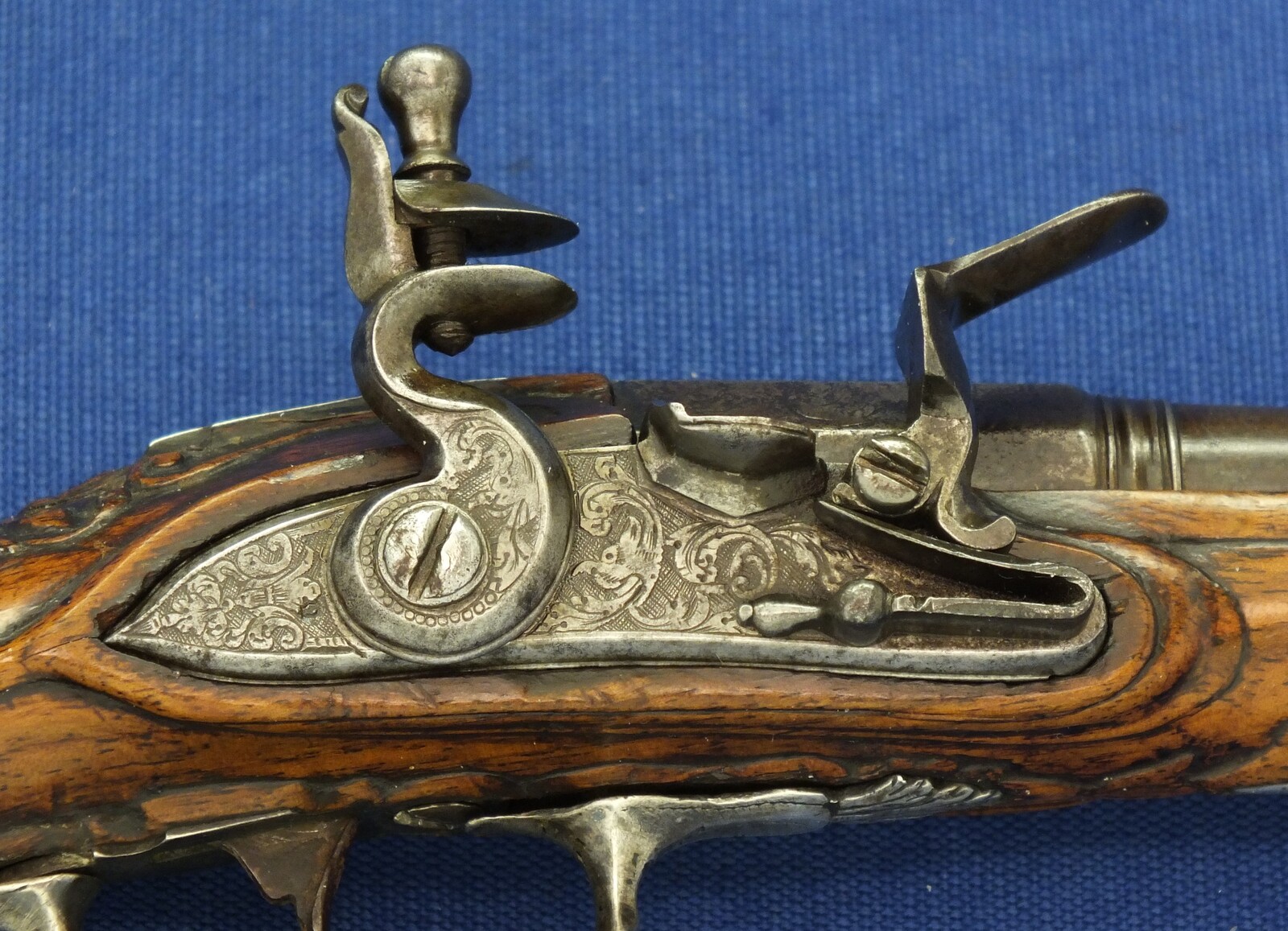 A fine antique 18th century French Silver mounted small Flintlock Pocket pistol circa 1760. Caliber 10mm rifled, length 18,5cm. In very good condition. Price 1.250 euro.