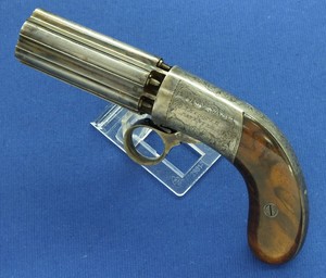 A fine antique 19th century 6 Shot English Percussion Underhammer  Pepperbox by Joseph Rock Cooper Birmingham/London, caliber 9 mm, length 21 cm, in near mint condition.
