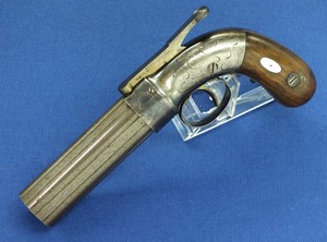 A fine antique 19th century American Stocking & Co,  Worchester Massachusetts Percussion Pepperbox with extended angular cocking spur on hammer, .28 caliber, length  21 cm, in very good condition. Price 1.450 euro