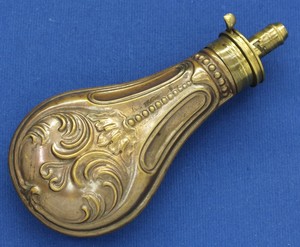 A fine antique 19th Century Embossed English Powder Flask, signed 