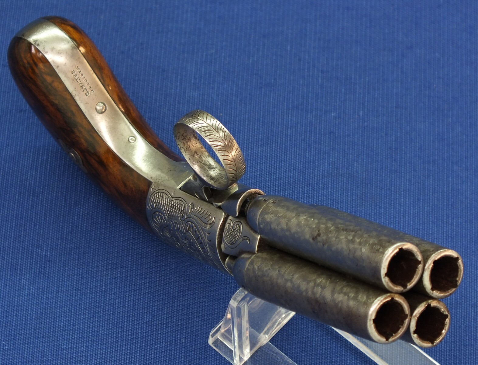 A fine antique 19th century engraved Belgian Liege 4 shot underhammer Mariette Brevete percussion Pepperbox. Caliber 9mm, length 19cm. In very good condition. Price 850 euro.
