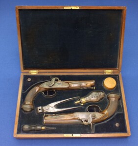 A fine antique 19th Century French Cased Pair Percussion Pistols, caliber 14 mm , length 27,5 cm, in very good condition. Price 3.750 euro
