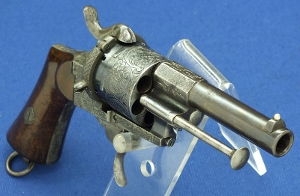 A fine antique 19th Century French Pinfire Revolver by Lefaucheux a Paris, caliber 10 mm, length 23,5 cm, in near mint condition. Price 950 euro