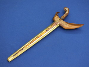A fine antique 19th century Indonesian Maduro Keris with brass scabbard cover, length 48 cm, in very good condition. Price 185 euro