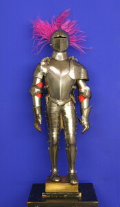 A fine antique 19th century Minature tournament suit of armor. In very good condition. Height 60cm. Price 2.475,- euro