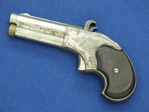 A fine antique American engraved Nickel plated Remington - Rider Magazin Pistol, .32 Rimfire Extra Short, five shot magazin, in very good condition. Price 1.175 euro