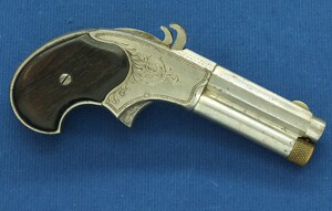 A fine antique American engraved Nickel plated Remington - Rider Magazin Pistol, .32 Rimfire Extra Short, five shot magazin, in very good condition. Price 1.350 euro.
