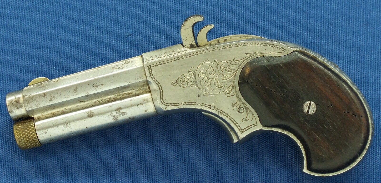 A fine antique American engraved Nickel plated Remington - Rider Magazin Pistol, .32 Rimfire Extra Short, five shot magazin, in very good condition. Price 1.350 euro.