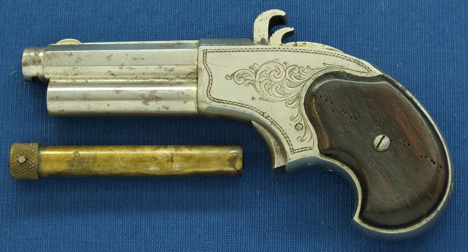 A fine antique American engraved Nickel plated Remington - Rider Magazin Pistol, .32 Rimfire Extra Short, five shot magazin, in very good condition. Price 1.350 euro.