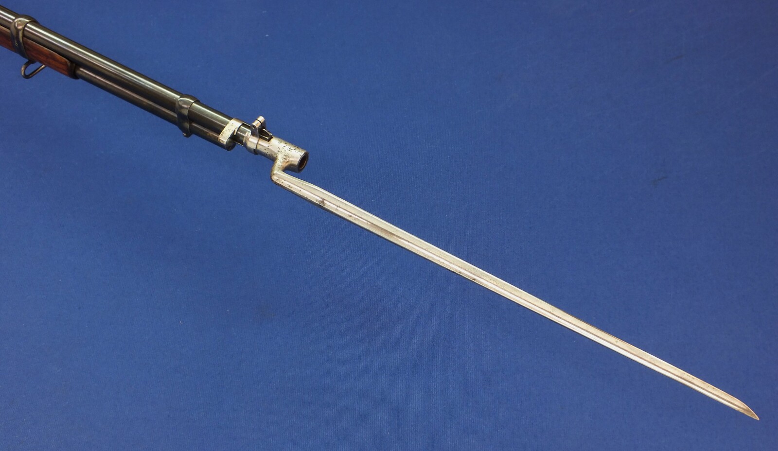 A fine antique American L.D. Nimschke Engraved Winchester Model 1866 Yellow Boy Musket with original Bayonet. 44 Henry Rimfire caliber, 27 inch barrel. Length 118cm. In very good condition. Price on request