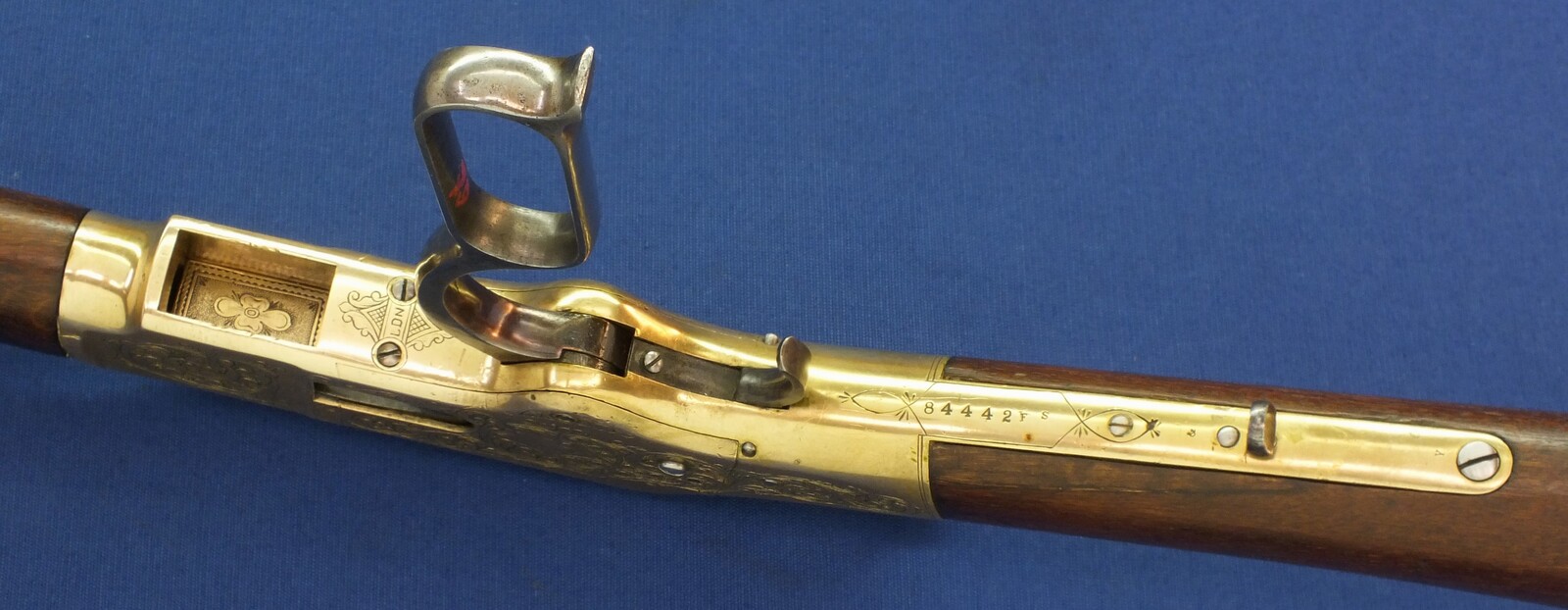 A fine antique American L.D. Nimschke Engraved Winchester Model 1866 Yellow Boy Musket with original Bayonet. 44 Henry Rimfire caliber, 27 inch barrel. Length 118cm. In very good condition. Price on request