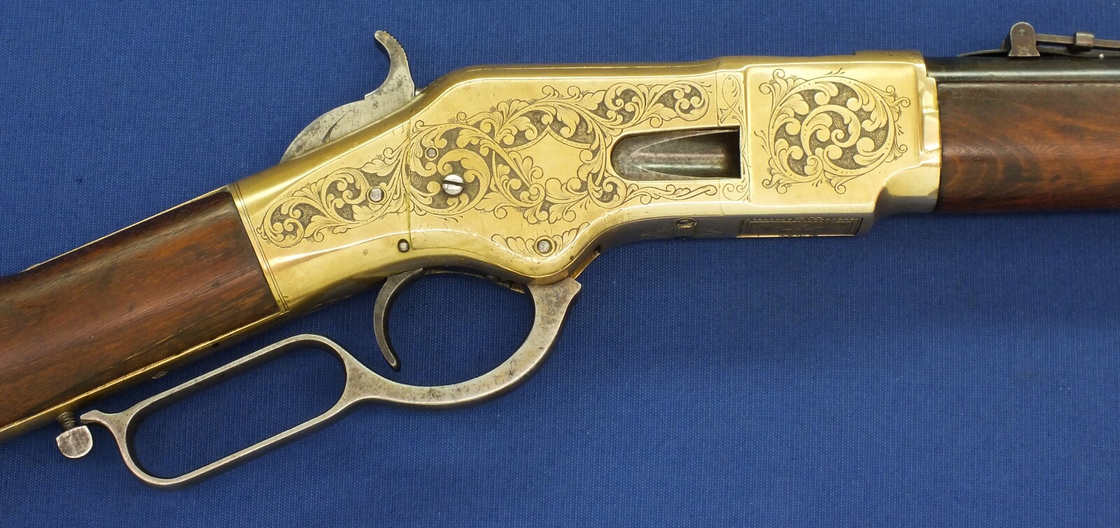 A fine antique American L.D. Nimschke Engraved Winchester Model 1866 Yellow Boy Musket with original Bayonet. 44 Henry Rimfire caliber, 27 inch barrel. Length 118cm. In very good condition. Price on request