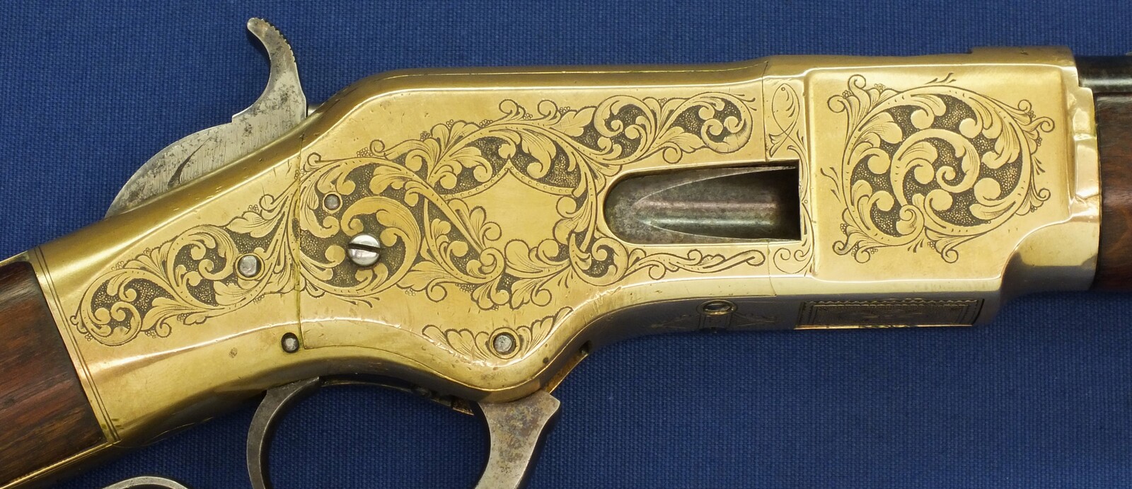 A fine antique American L.D. Nimschke Engraved Winchester Model 1866 Yellow Boy Musket with original Bayonet. 44 Henry Rimfire caliber, 27 inch barrel. Length 118cm. In very good condition. Price on request