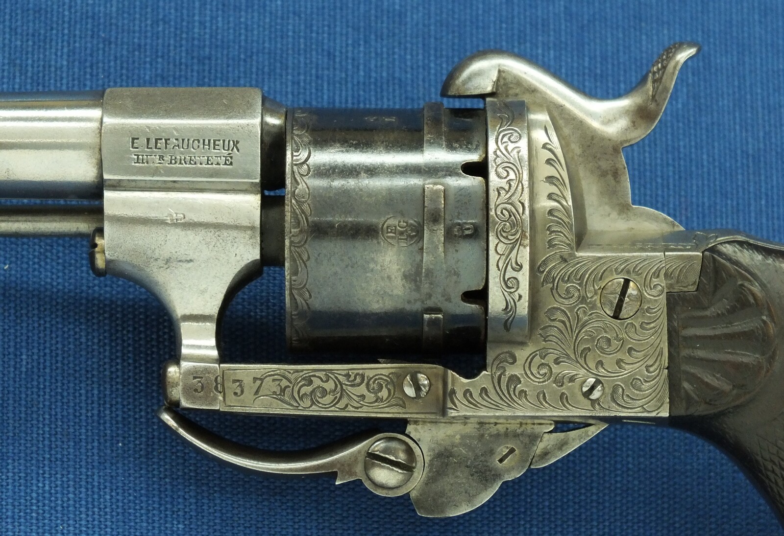 A fine antique Belgian Eugene Lefaucheux 6 shot Single and Double Action Pinfire Revolver. 7mm Caliber. Length 20,5cm. In very good condition. Price 850 euro.