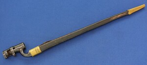 A fine Antique British model / Pattern 1853 Enfield Bayonet with original leather scabbard marked with Broad Arrow over WD. Length 52,8cm. In very good condition. 