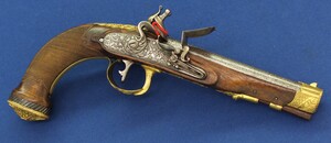 A fine antique circa 1800-20 Karlsbad type Flintlock pistol with Damascus barrel. Caliber 12mm. Length 30cm. In very good condition. Price 2.750 euro