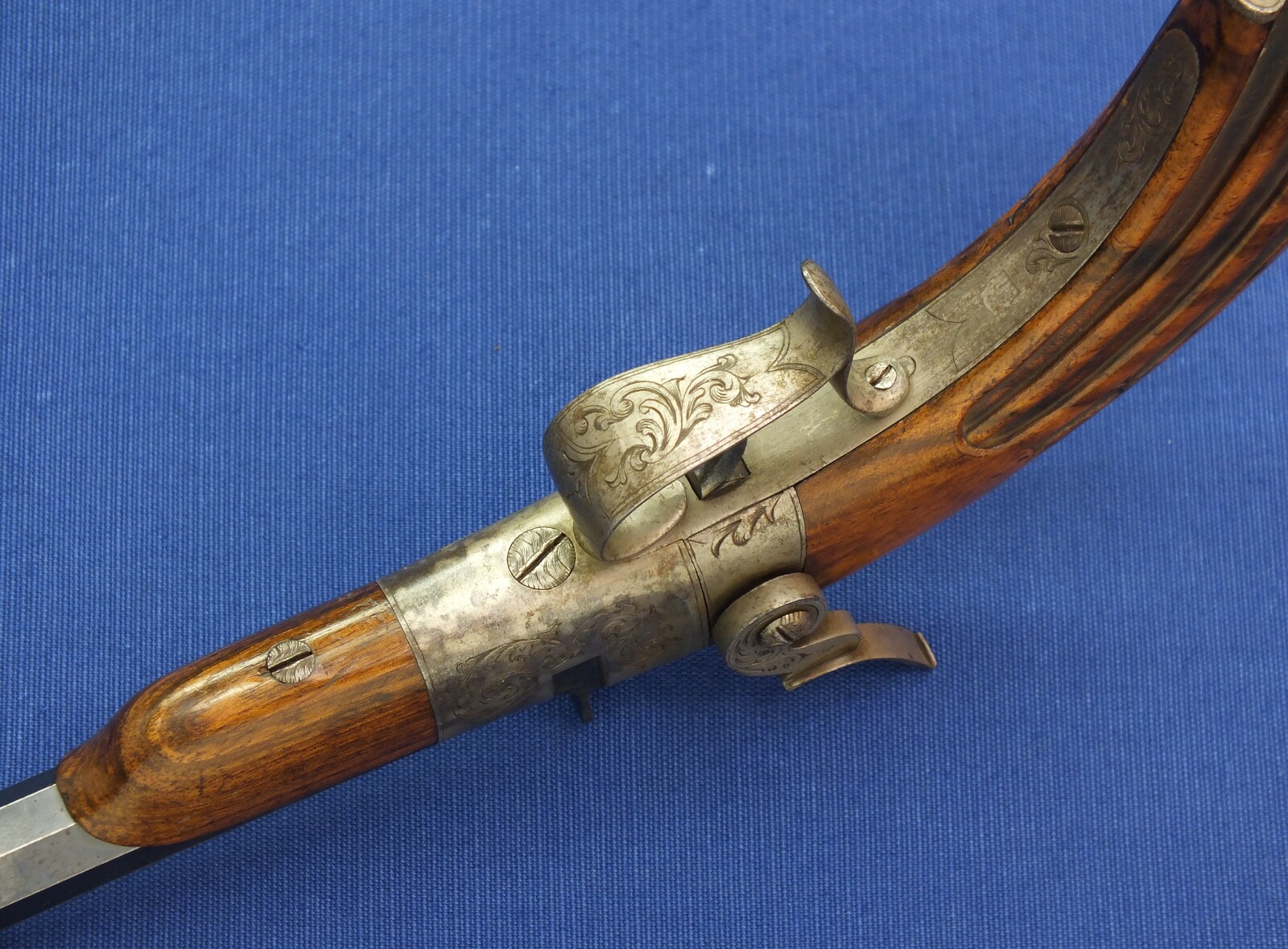 A fine antique French 6mm breech loading percussion target/saloon Pistol with internal hammer.  8 inch octagon barrel. Length 38cm. In near mint condition. Price 995 euro.