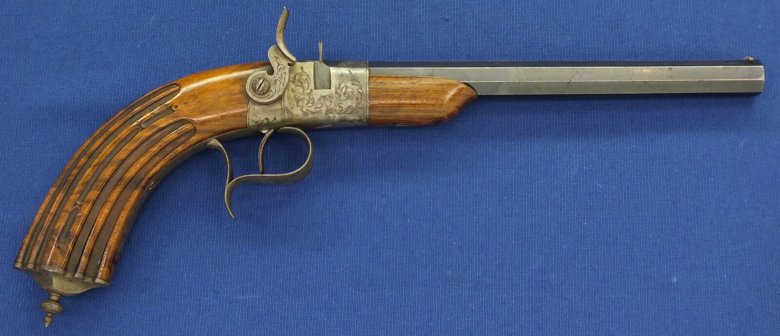 A fine antique French 6mm breech loading percussion target/saloon Pistol with internal hammer.  8 inch octagon barrel. Length 38cm. In near mint condition. Price 995 euro.