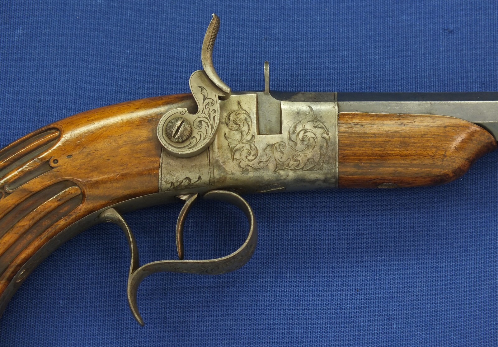 A fine antique French 6mm breech loading percussion target/saloon Pistol with internal hammer.  8 inch octagon barrel. Length 38cm. In near mint condition. Price 995 euro.