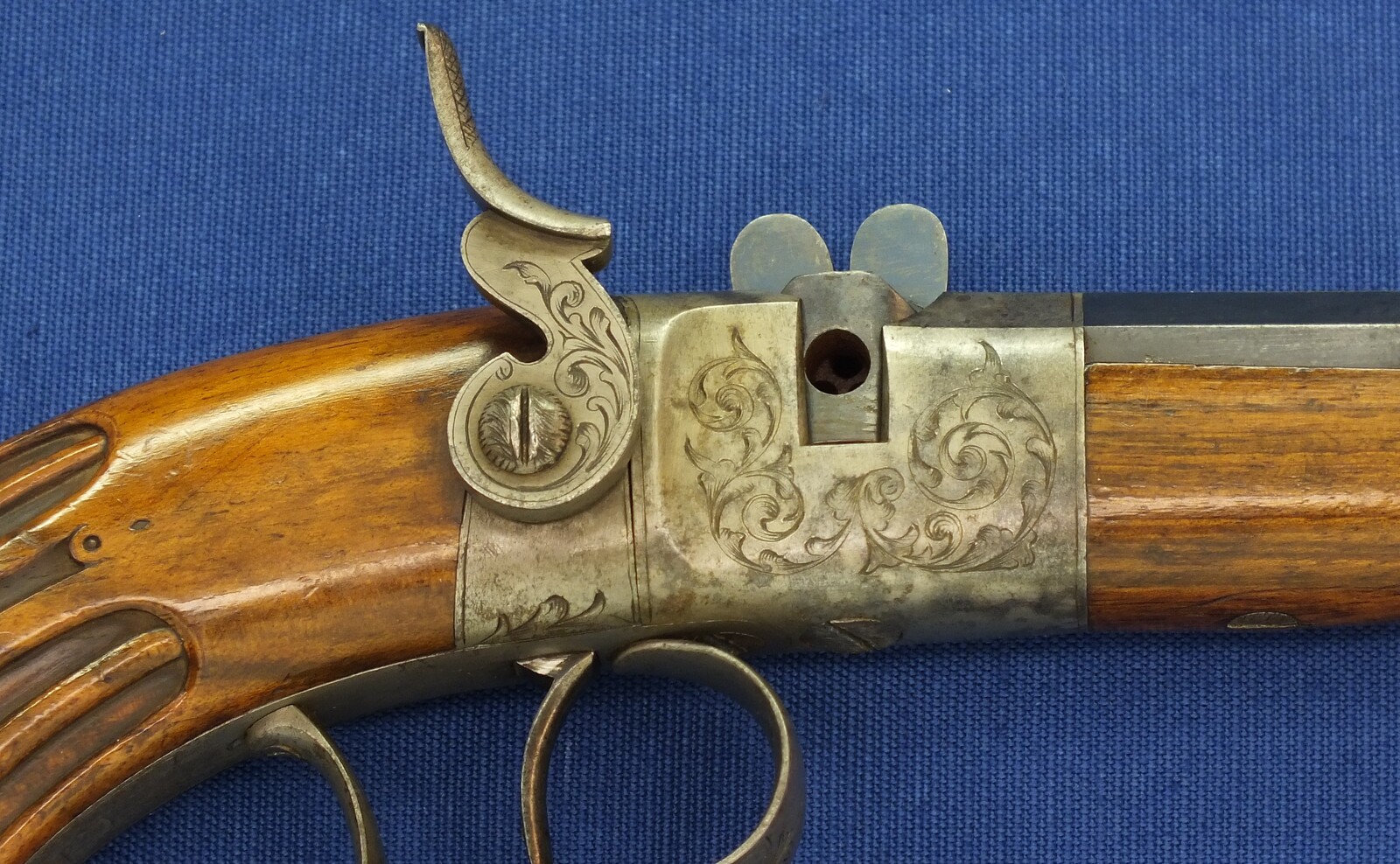 A fine antique French 6mm breech loading percussion target/saloon Pistol with internal hammer.  8 inch octagon barrel. Length 38cm. In near mint condition. Price 995 euro.