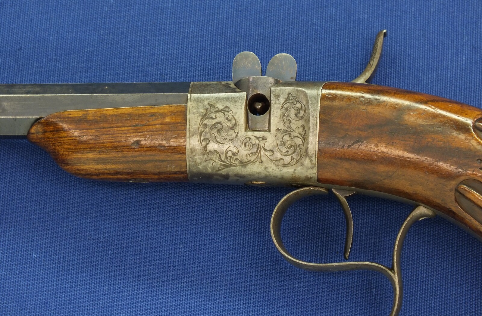 A fine antique French 6mm breech loading percussion target/saloon Pistol with internal hammer.  8 inch octagon barrel. Length 38cm. In near mint condition. Price 995 euro.