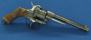 A fine antique French Floral engraved Lefaucheux type 6 shot 9mm Pinfire Revolver. Length 30cm. In very good condition. Price 950 euro.