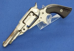 A fine antique Nickel Plated Remington New Model Pocket Conversion Revolver, .32 Rimfire Caliber,  3 1/2 inch Barrel,  in very good condition. Price 975 euro.