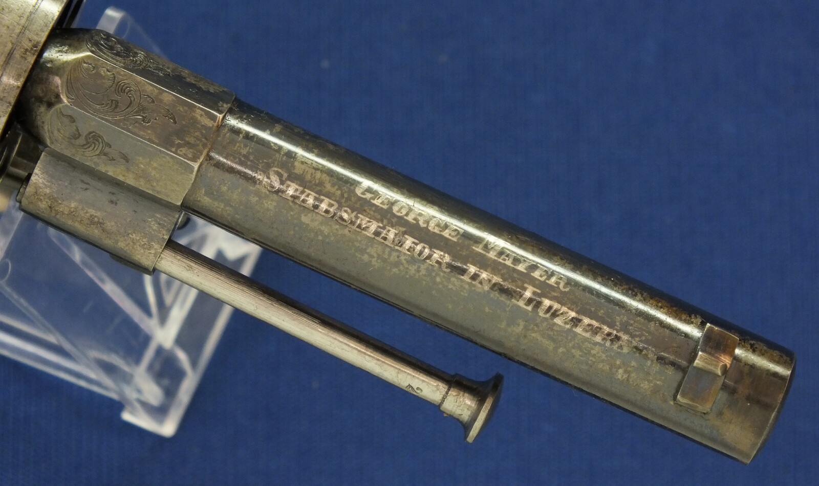 A fine antique Swiss Oak Cased engraved 6 shot 9mm Pinfire Revolver. Barrel signed: GEORGE MAYER STABSMAIOR IN LUZERN. Length 23cm. In very good condition. 