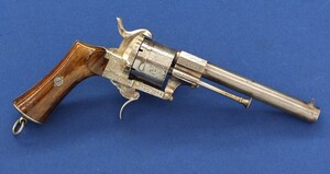 A fine Liege Lepage Freres engraved Lefaucheux type 6 shot single and double action 12mm Pinfire Revolver. Signed: Fabrique de Lepage Freres a Liege Maison a Paris, 12 Rue d'Enghien. Lenght 31,5cm. In very good condition. Price 1.750 euro