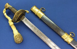 A fine reproduction US Horstmann & Son Philadelphia Model 1850 Staff & Field Officer's Sword with etched blade and blued Iron scabbard with Brass mounts complete with knot. Length 93,5cm. In very good condition. Price 250 euro