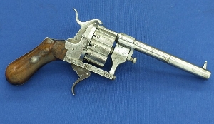 A French antique fine engraved 12 shot single and double action Pinfire Revolver with folding trigger. Caliber 9mm, length 30cm. In good condition. Price 1700,- euro 