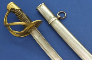A French Model 1822 Light Cavalry Sword, singed on back of blade: Manufacture d'Armes de Chatterault Avril 1879 Cavalerie Légère Model 1822. Length 111cm. In very good condition