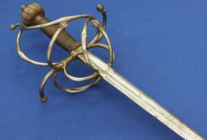 A German early 17th century Swipt Hilt Rapier with running Wolf of Passau mark. Length 112cm. In good/very good condition. Price 4.450 euro.
