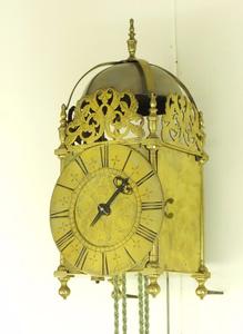 A nice English antique brass Lantern Clock with anchor escapement, signed Smorthwaite in Colchester, circa 1715. height 37 cm Price 3.750 euro
