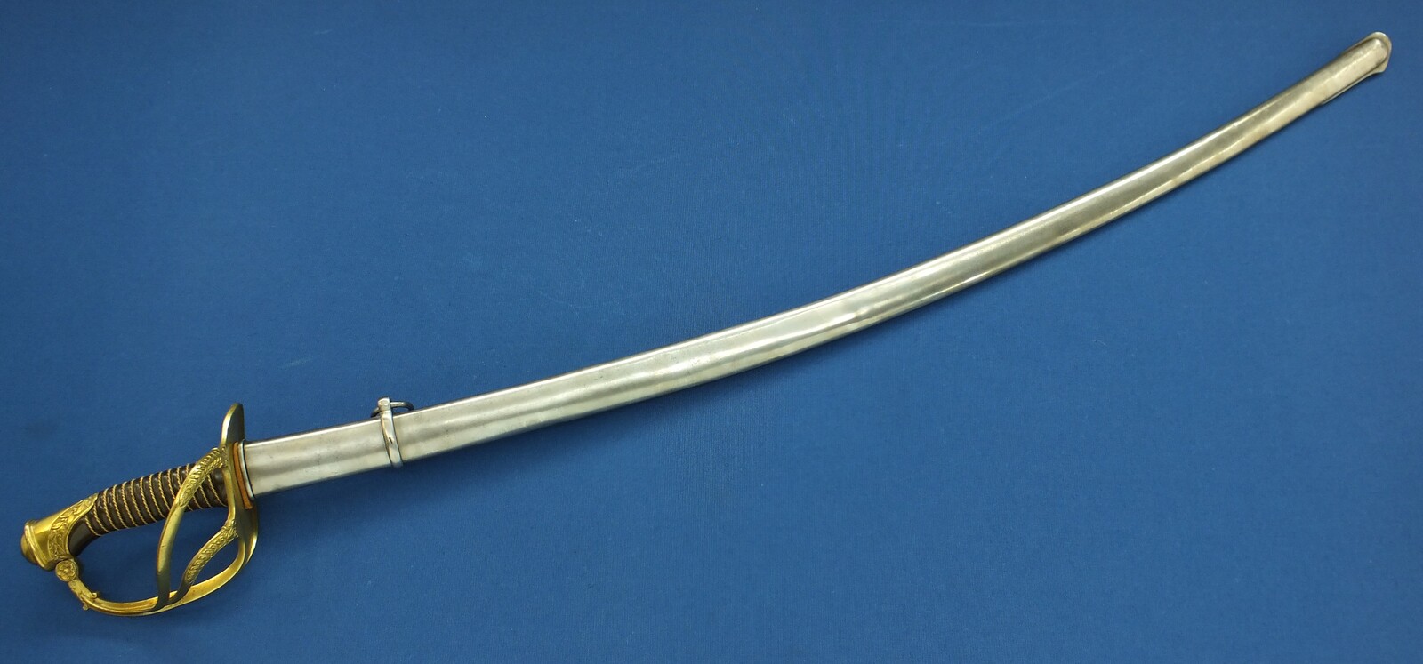 A personalised antique French Officers Cavalry Sword Model 1822, signed Manufacture Klingenthal Coulaux, total length 110 cm, in very good condition. Price 750 euro