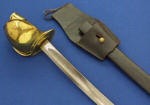 A rare American Civil War US Model 1860 Naval Cutlass by Ames Mfg. Co. Dated 1862 with original Leather Scabbard. Length 82cm. In very good condition. Price 995 euro.